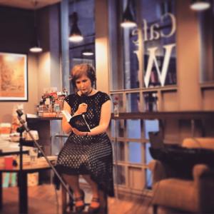 Me reading at Cafe W